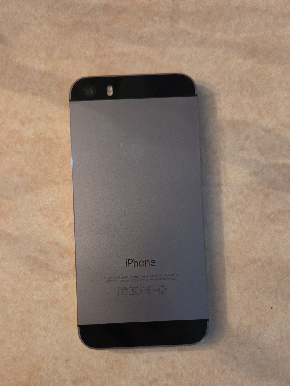 Apple iPhone in Space Gray and Black Accents